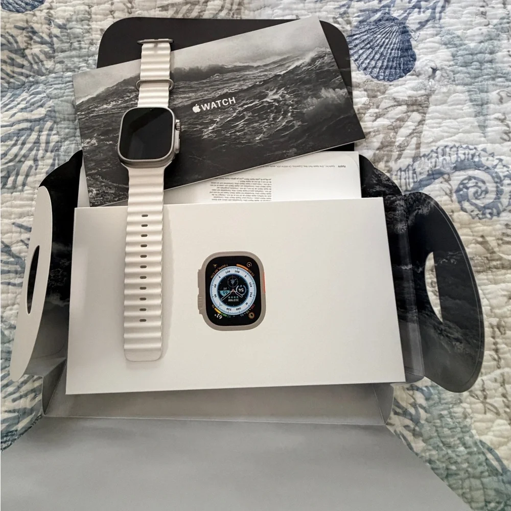 Apple Watch Ultra 1st Gen Smartwatch with White, Orange, and Yellow Bands